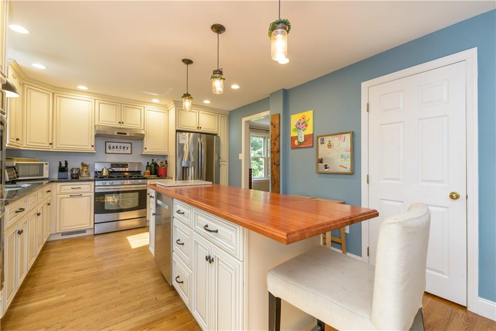 405 Oliver Road Sewickley, PA 15143 - Photo 7 of 25 Large center island with wood top in newly renovated kitchen.