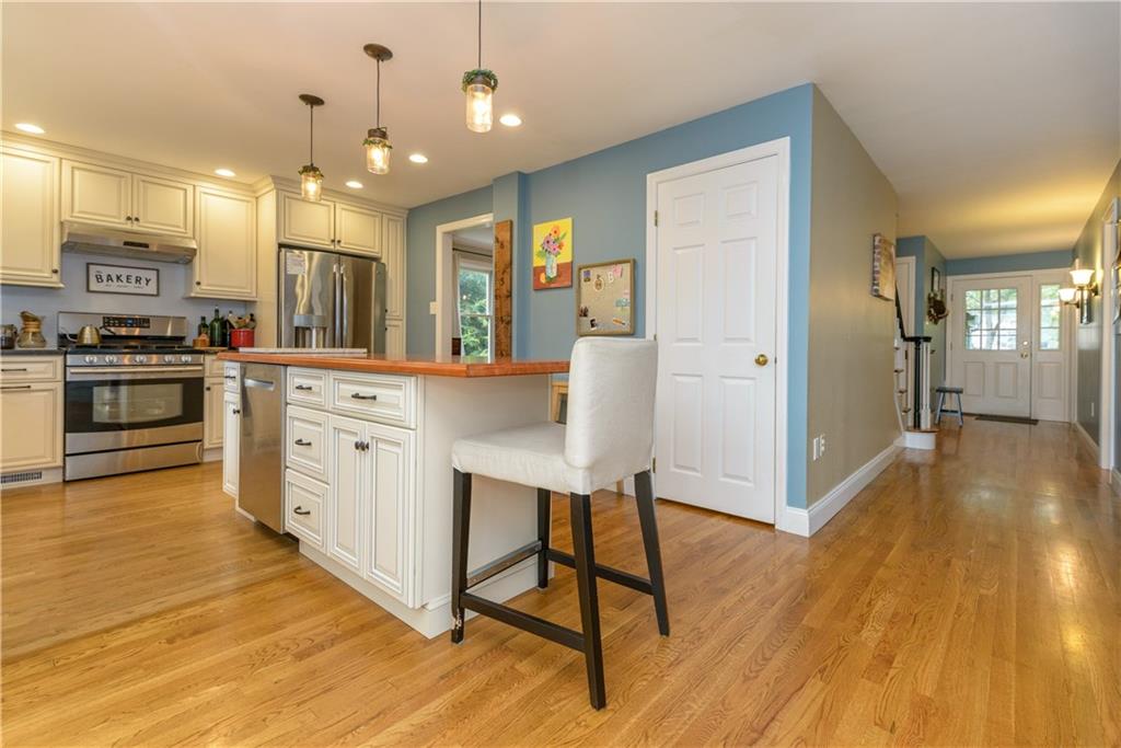 405 Oliver Road Sewickley, PA 15143 - Photo 8 of 25 Kitchen is open to dining room, family room and entry.