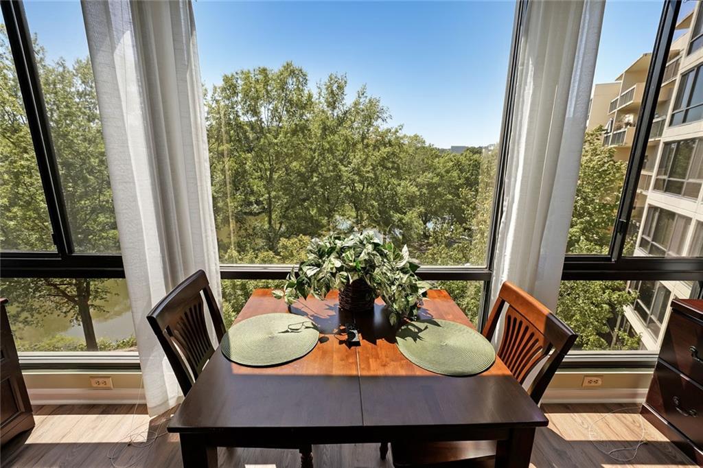 1800 Clairmont Lake, Unit A522 Decatur, GA 30033 - Photo 1 of 36 a outdoor dining room with furniture window and wooden floor