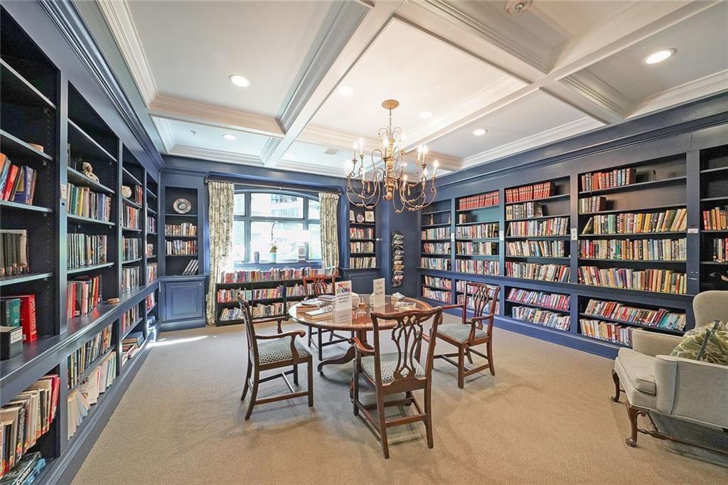 1800 Clairmont Lake, Unit A522 Decatur, GA 30033 - Photo 21 of 36 a view of a livingroom with furniture and a bookshelf