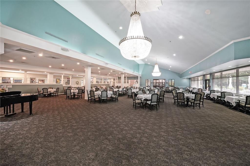 1800 Clairmont Lake, Unit A522 Decatur, GA 30033 - Photo 22 of 36 a view of a room with gym equipment and large windows