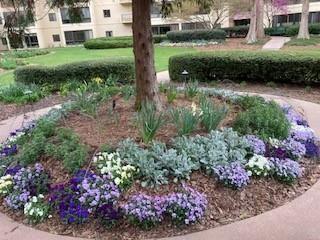 1800 Clairmont Lake, Unit A522 Decatur, GA 30033 - Photo 28 of 36 a view of a garden with a fountain