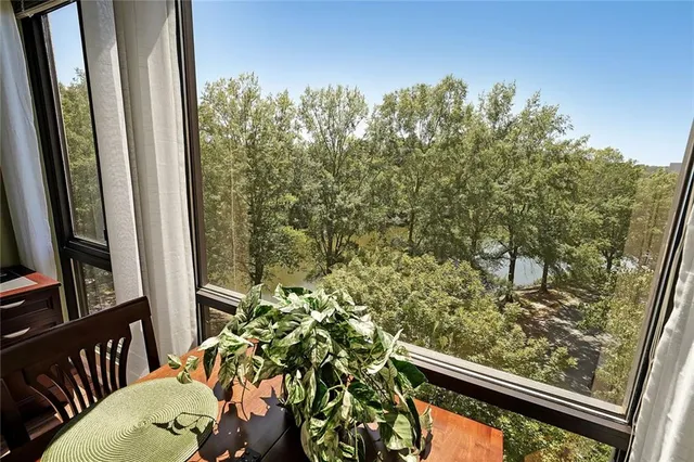 a view of balcony with furniture