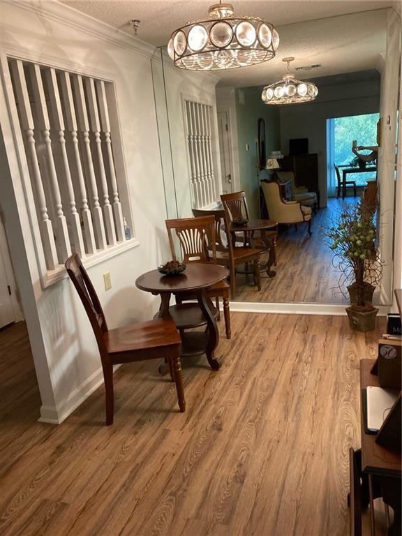 1800 Clairmont Lake, Unit A522 Decatur, GA 30033 - Photo 5 of 36 a view of a livingroom with furniture and a floor to ceiling window