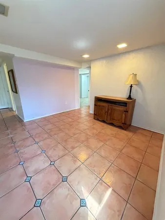 a view of workspace with wooden floor