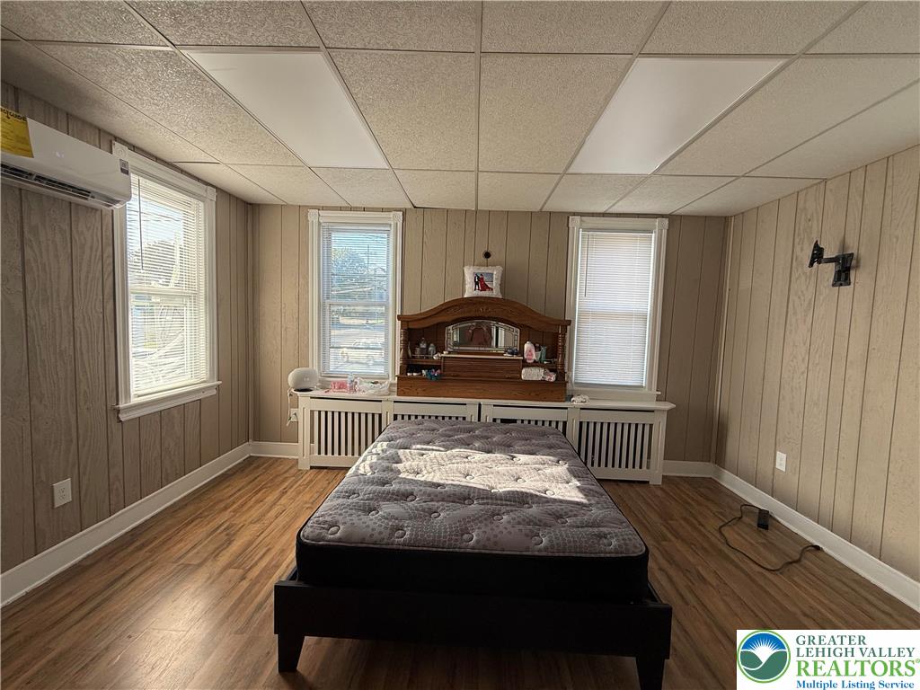 500 Belfast Road Nazareth, PA 18064 - Photo 12 of 36 a bedroom with a bed and wooden floor