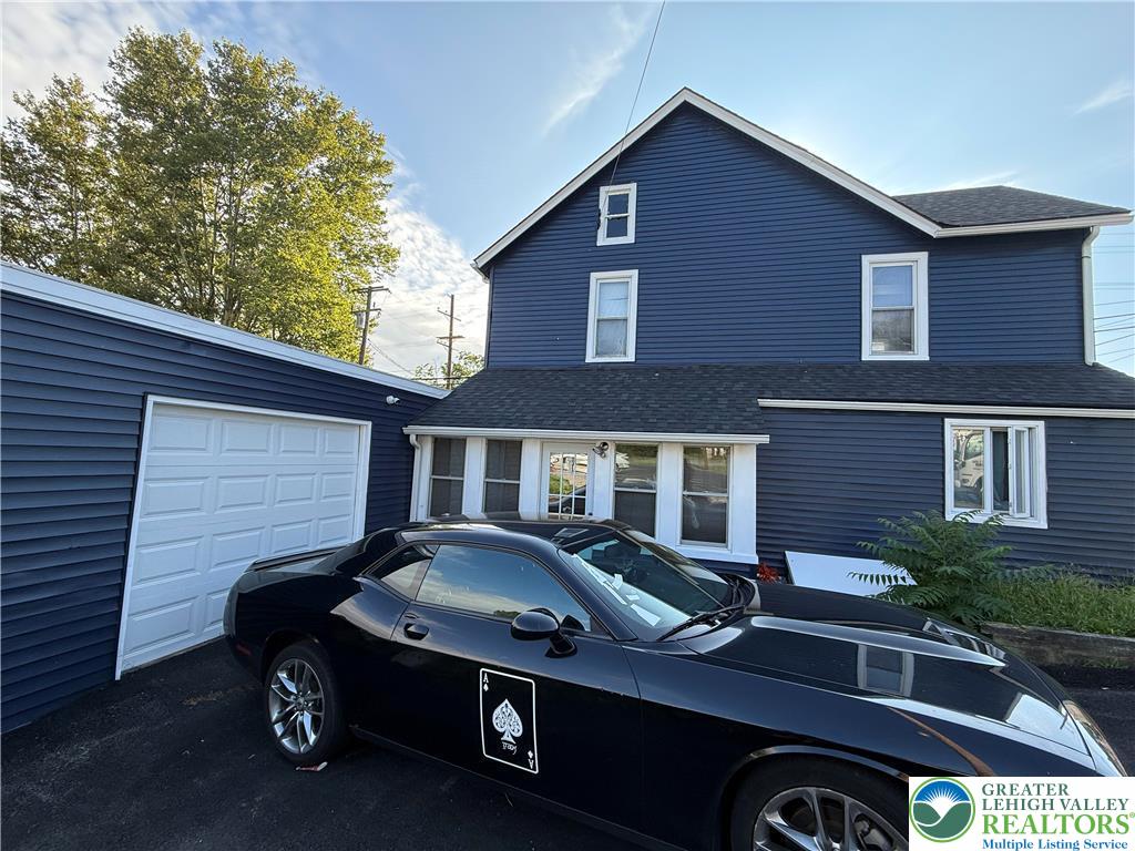 500 Belfast Road Nazareth, PA 18064 - Photo 2 of 36 a front view of a house with parking area