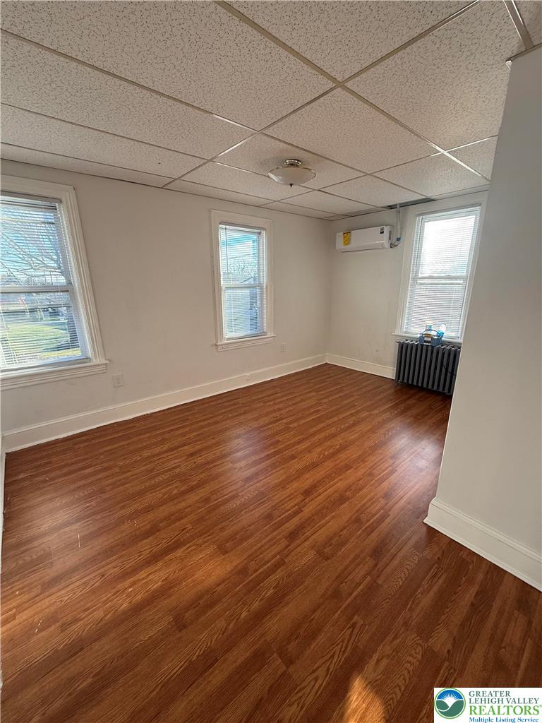 500 Belfast Road Nazareth, PA 18064 - Photo 24 of 36 an empty room with wooden floor and windows