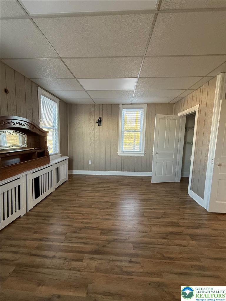 500 Belfast Road Nazareth, PA 18064 - Photo 28 of 36 a view of kitchen and empty room with wooden floor