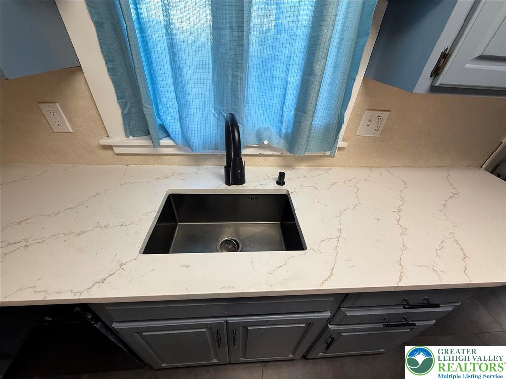 500 Belfast Road Nazareth, PA 18064 - Photo 9 of 36 a kitchen with a sink and a window