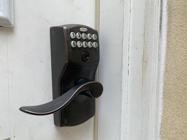 a close view of a utility room with dryer and washer