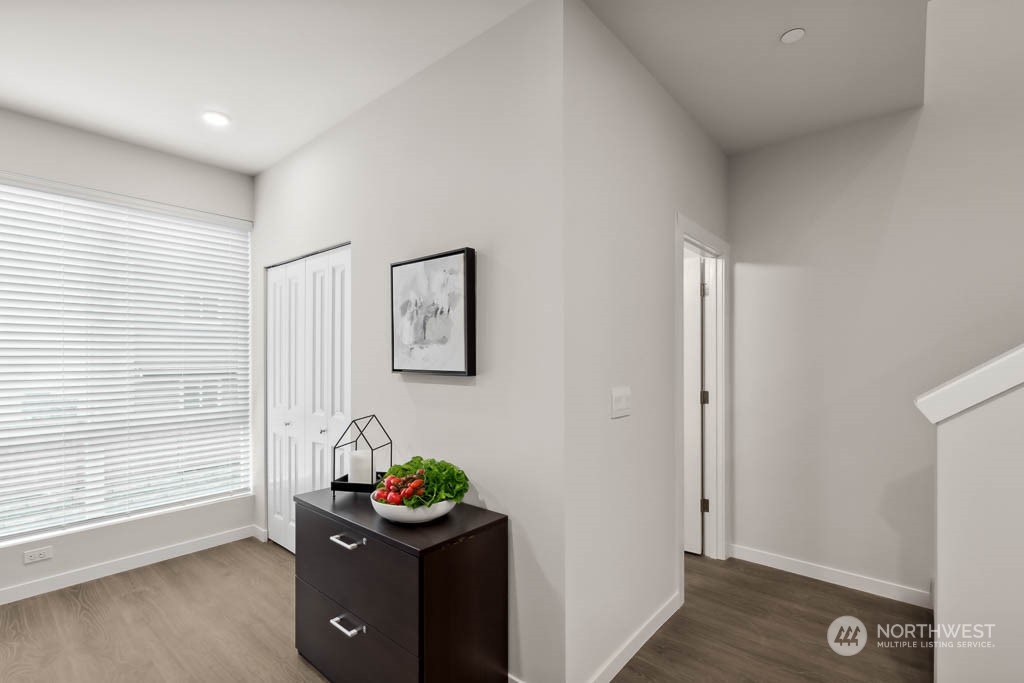 23413 Edmonds Way, Unit E4 Edmonds, WA 98026 - Photo 10 of 22 a view of a workspace with furniture and window