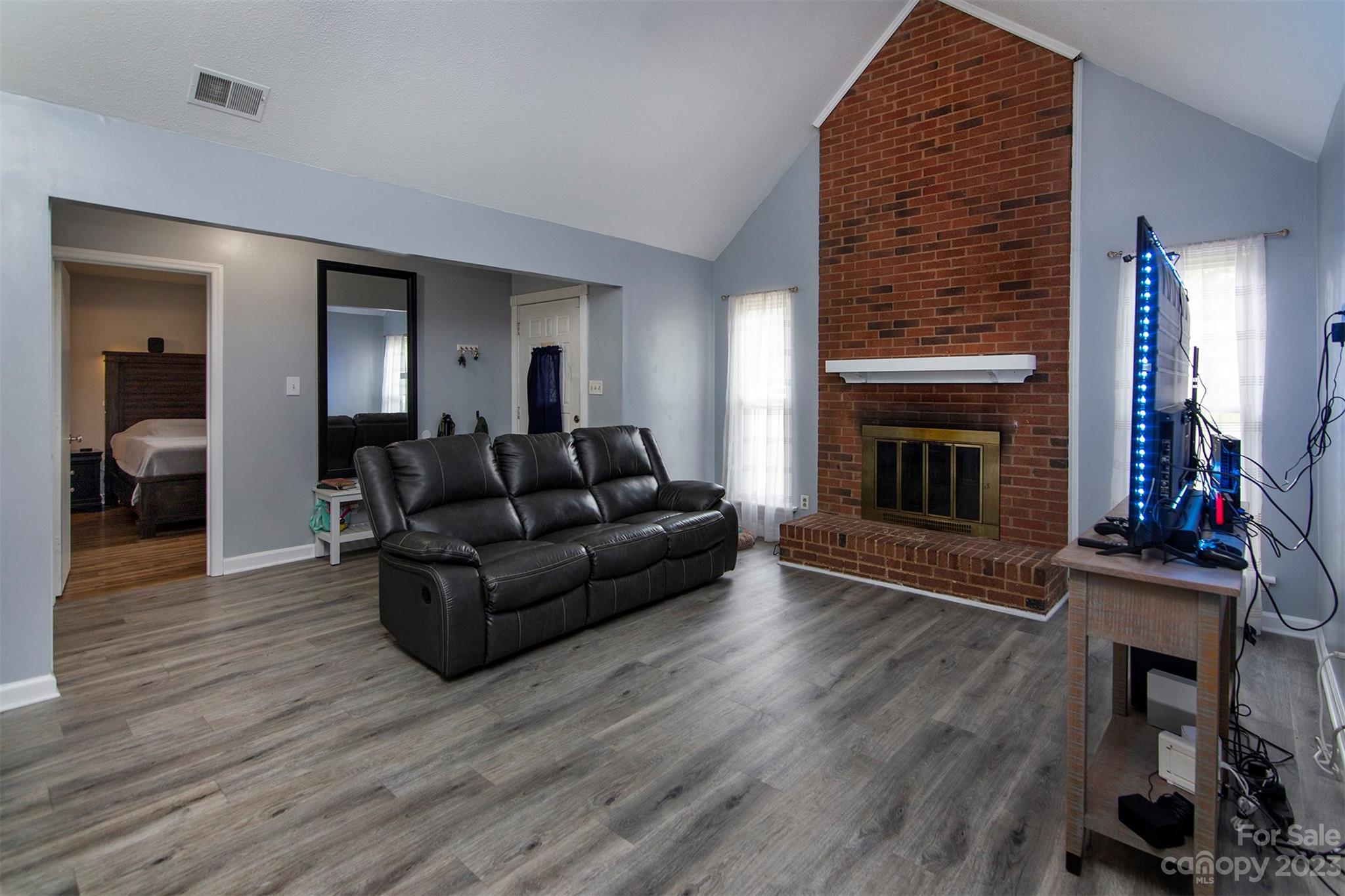 8014 Red Lantern Road Indian Trail, NC 28079 - Photo 5 of 24 a living room with furniture and a fireplace