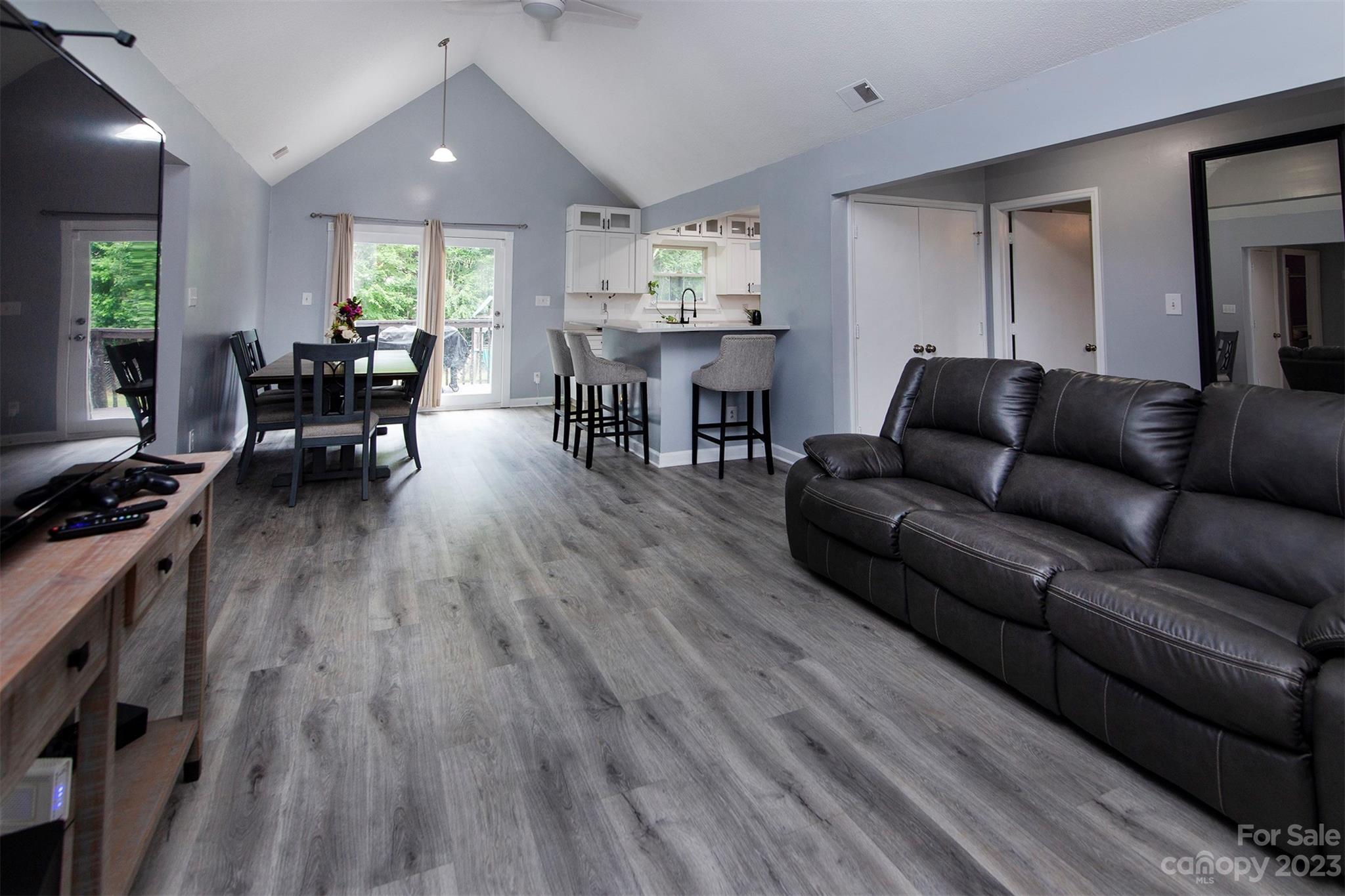 8014 Red Lantern Road Indian Trail, NC 28079 - Photo 6 of 24 a living room with furniture and wooden floor