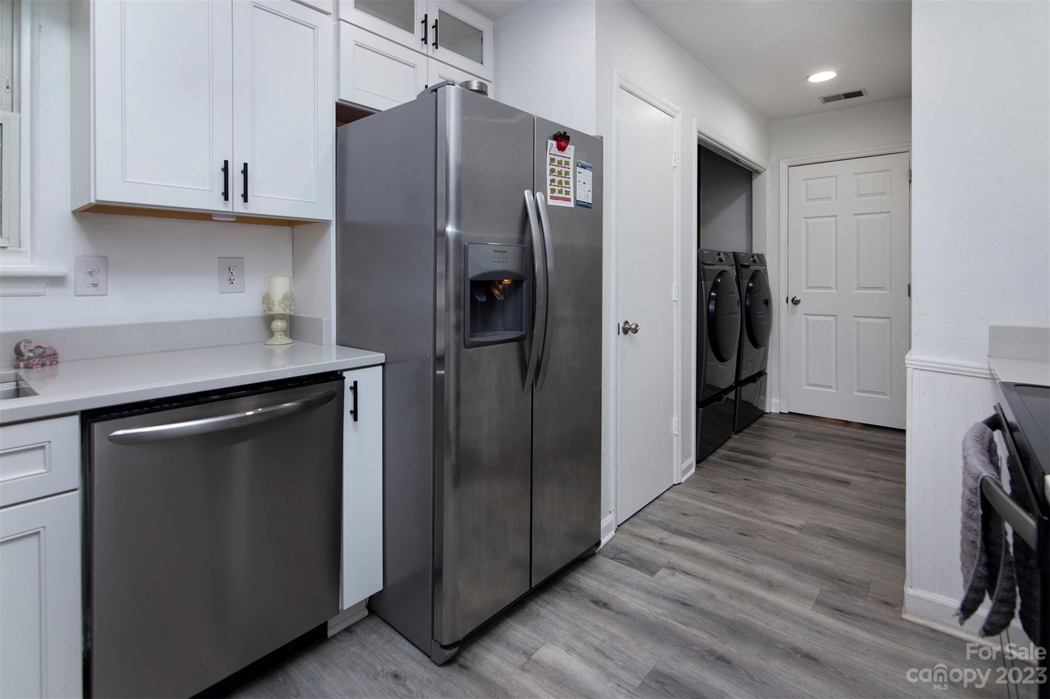 8014 Red Lantern Road Indian Trail, NC 28079 - Photo 10 of 24 a kitchen with stainless steel appliances a refrigerator and a stove