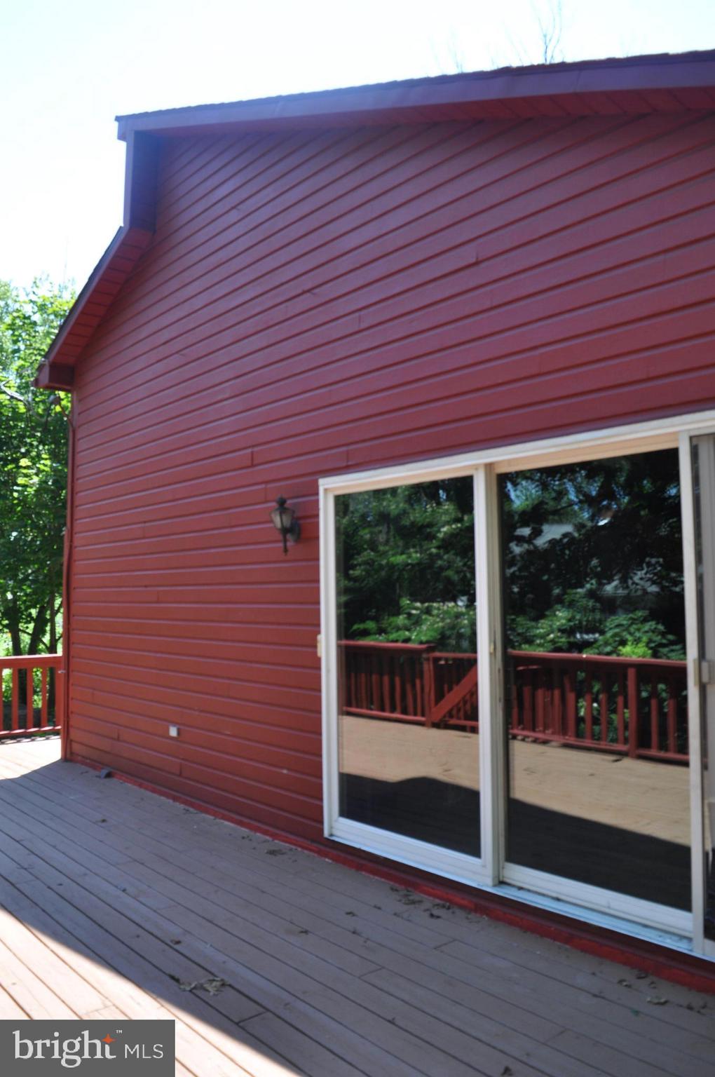 14618 Water Company Road Cascade, MD 21719 - Photo 5 of 105 right side of the home from the deck