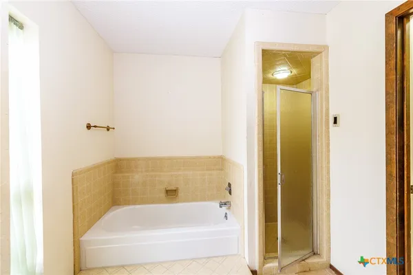 a bathroom with a bathtub