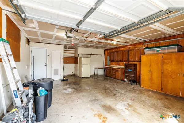 a view of a garage with storage