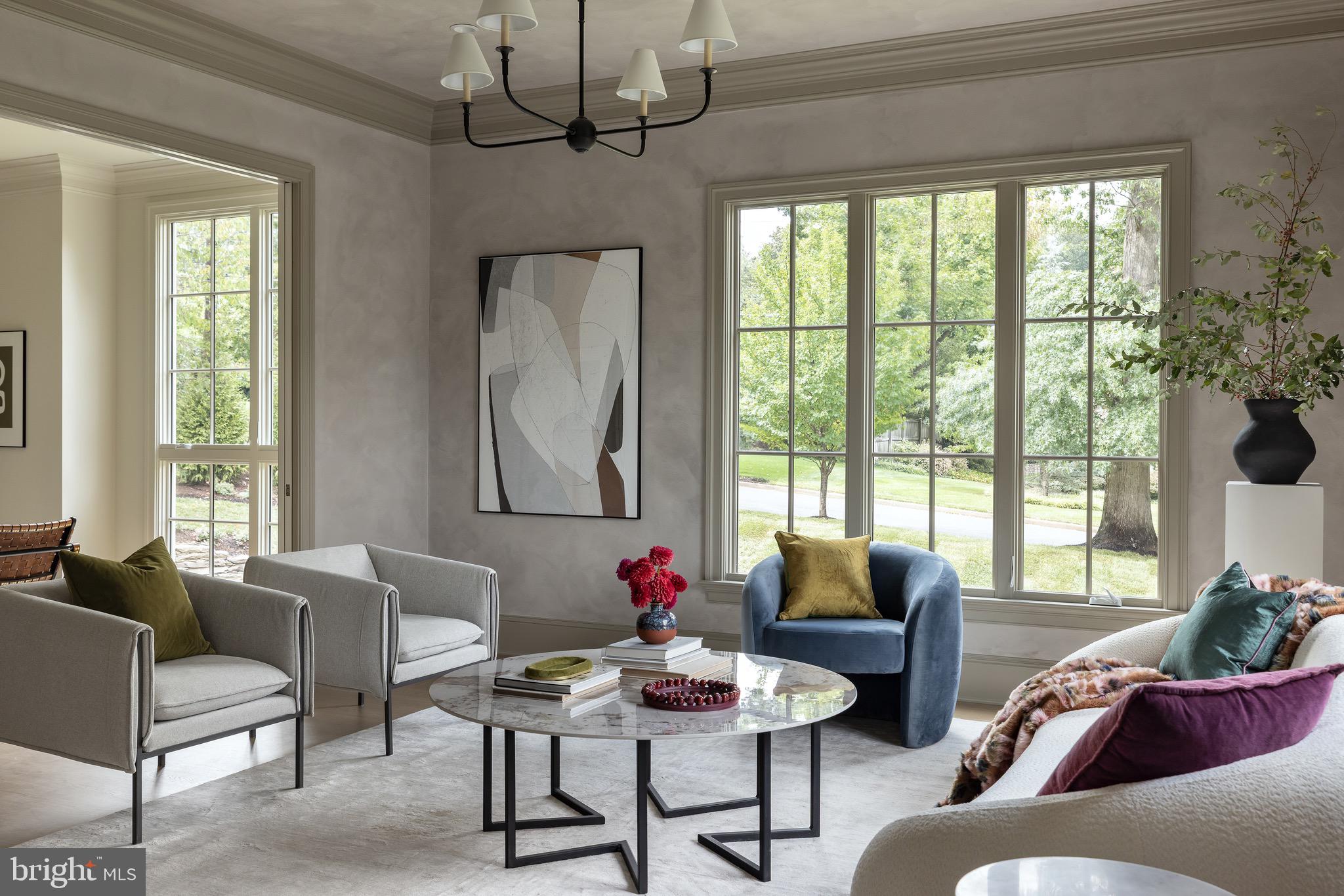 2934 Ellicott Terrace Northwest Washington, DC 20008 - Photo 11 of 55 a living room with furniture or outdoor view and a chandelier