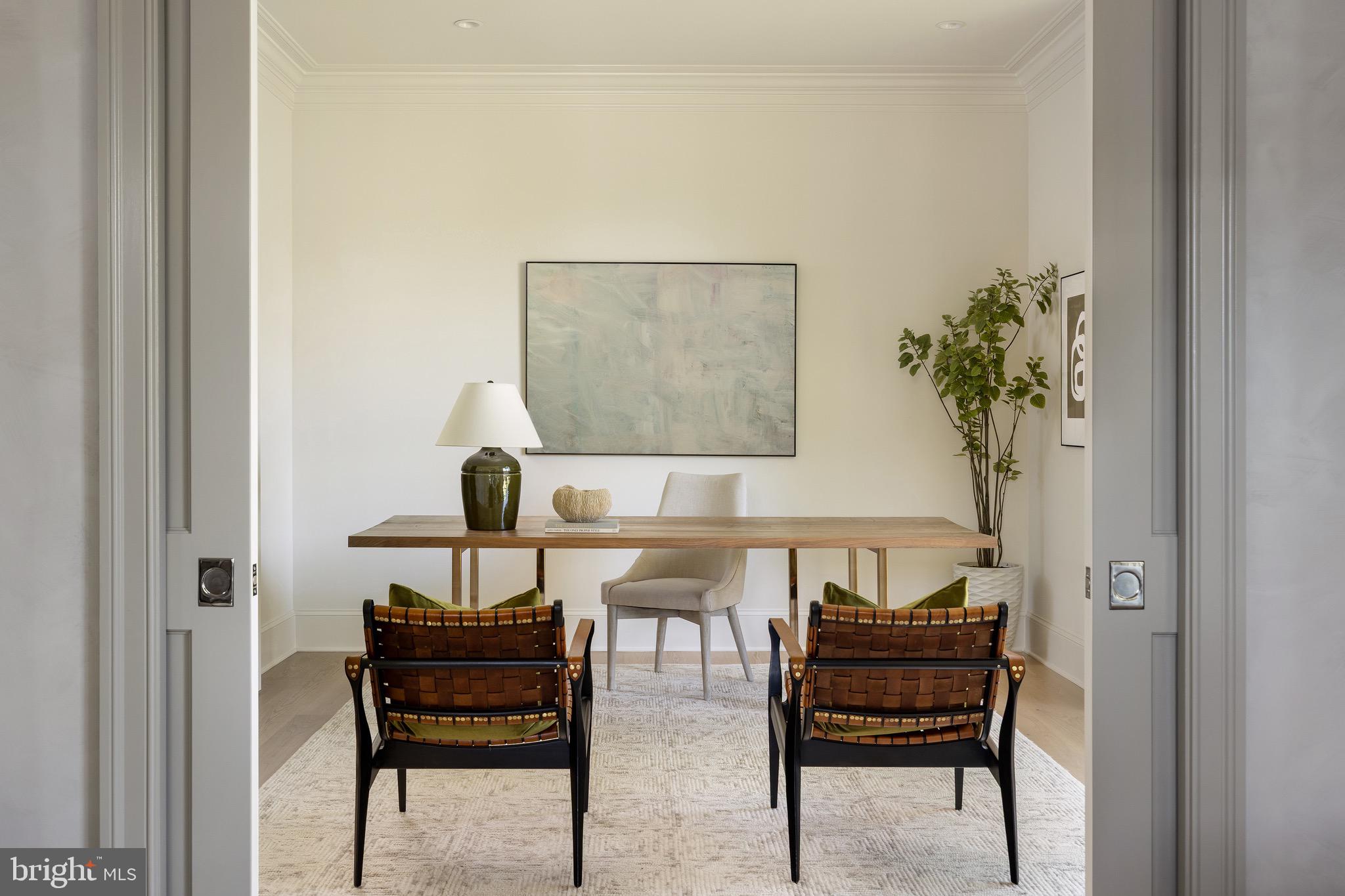 2934 Ellicott Terrace Northwest Washington, DC 20008 - Photo 13 of 55 a living room with furniture and a potted plant