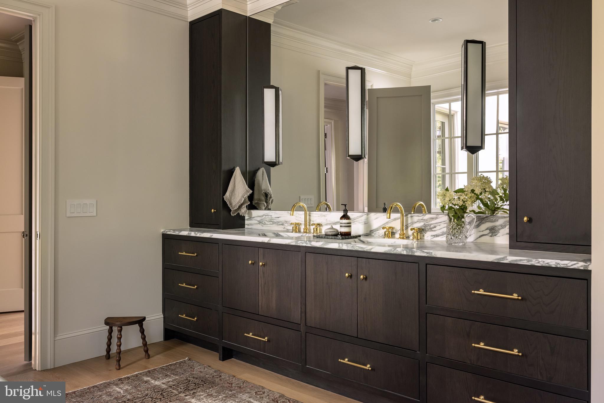 2934 Ellicott Terrace Northwest Washington, DC 20008 - Photo 28 of 55 a bathroom with a double vanity sink and mirror