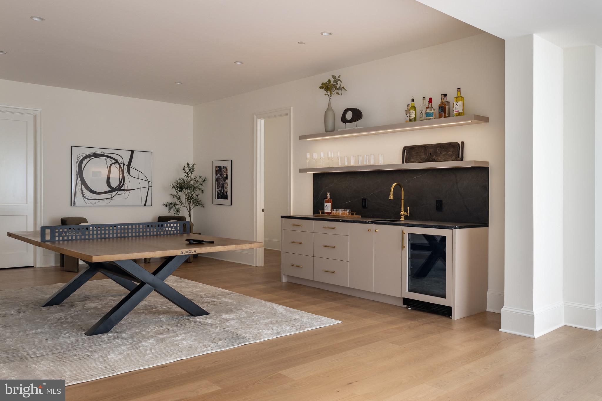 2934 Ellicott Terrace Northwest Washington, DC 20008 - Photo 44 of 55 a living room with furniture and wooden floor