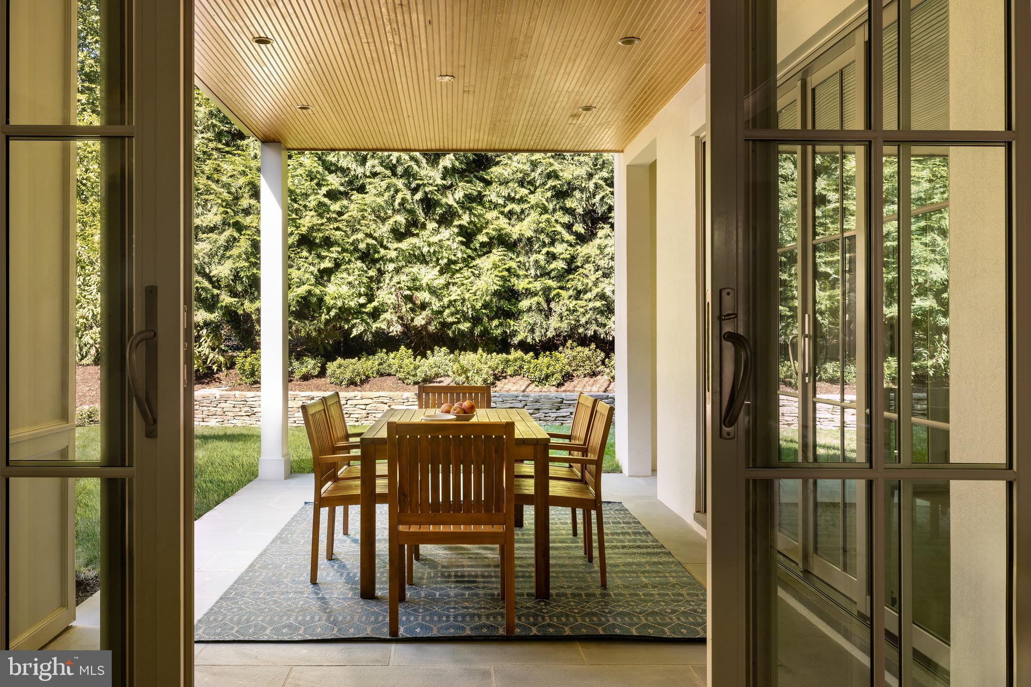 2934 Ellicott Terrace Northwest Washington, DC 20008 - Photo 6 of 55 a dining room with furniture and wooden floor