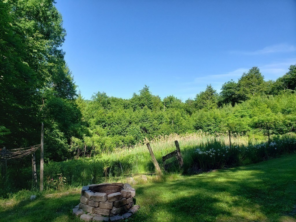 31 Goss Hill Road Huntington, MA 01050 - Photo 7 of 20 a view of a lake with a yard
