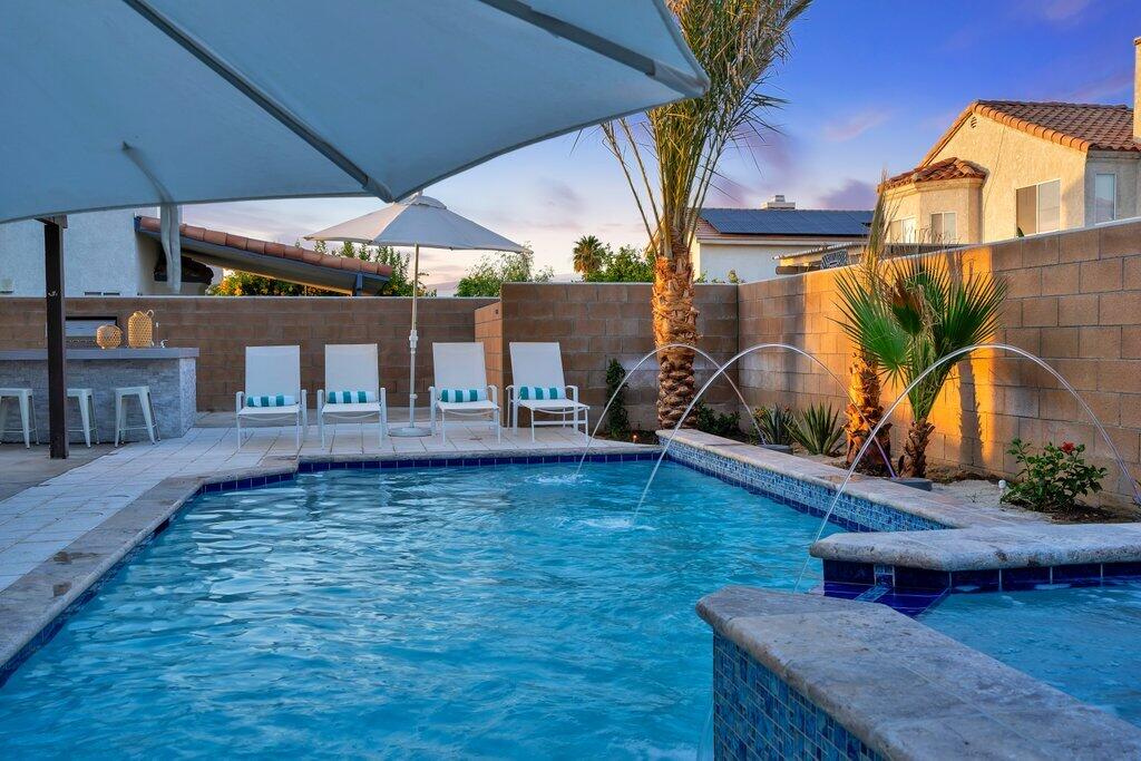 46352 Willow Lane Indio, CA 92201 - Photo 101 of 131 a view of a backyard with sitting area