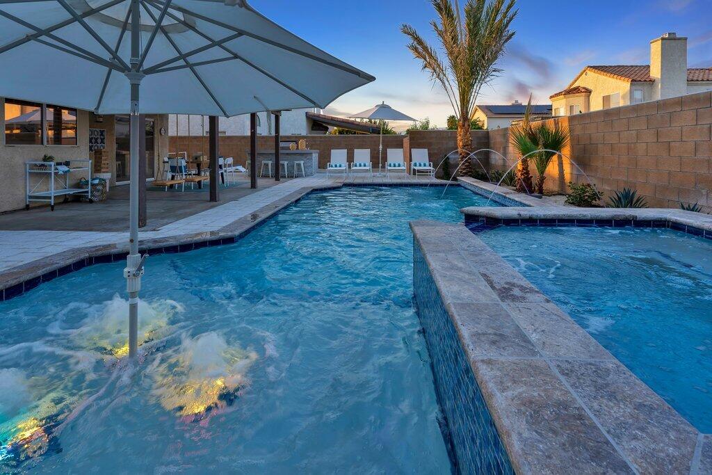 46352 Willow Lane Indio, CA 92201 - Photo 105 of 131 a view of a backyard with sitting area