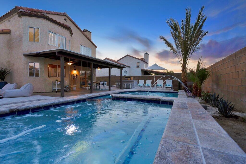 46352 Willow Lane Indio, CA 92201 - Photo 126 of 131 a view of a house with swimming pool next to a yard