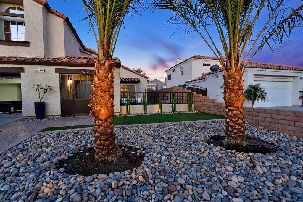 46352 Willow Lane Indio, CA 92201 - Photo 13 of 131 a front view of a house with a yard