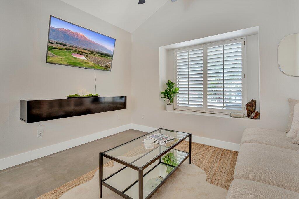 46352 Willow Lane Indio, CA 92201 - Photo 19 of 131 a living room with furniture and a large window