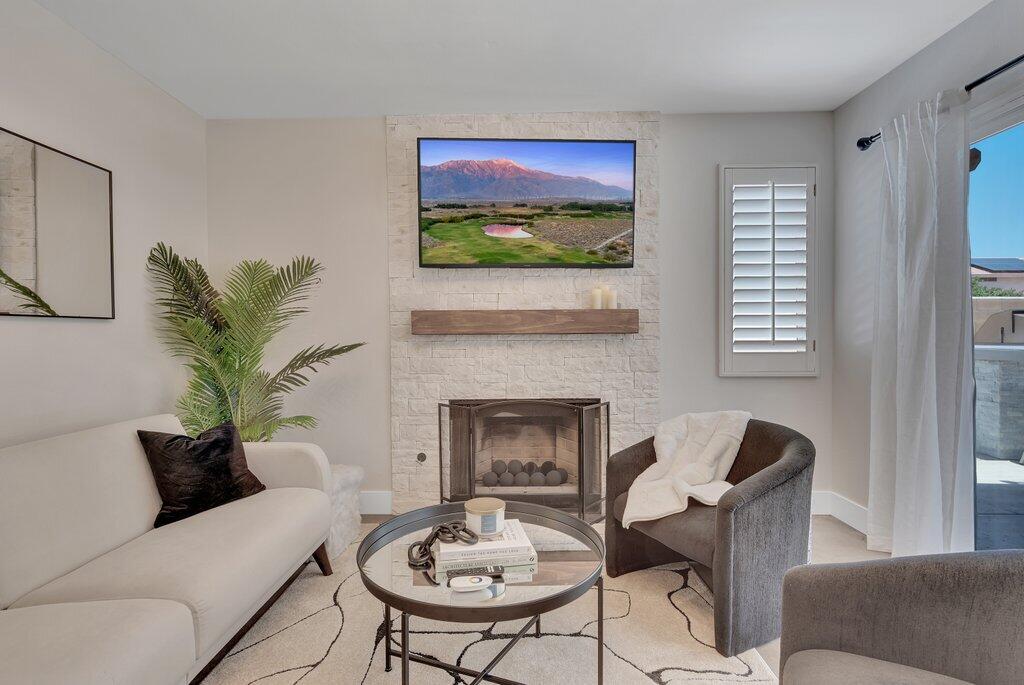 46352 Willow Lane Indio, CA 92201 - Photo 33 of 131 a living room with furniture potted plant and a fireplace