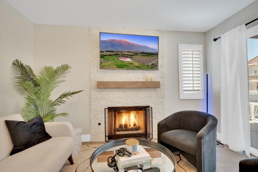 46352 Willow Lane Indio, CA 92201 - Photo 37 of 131 a living room with furniture and a fireplace