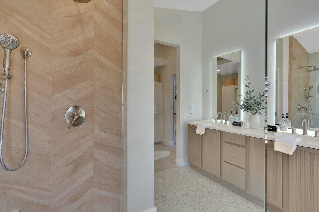 46352 Willow Lane Indio, CA 92201 - Photo 57 of 131 a bathroom with a double vanity sink mirror and shower