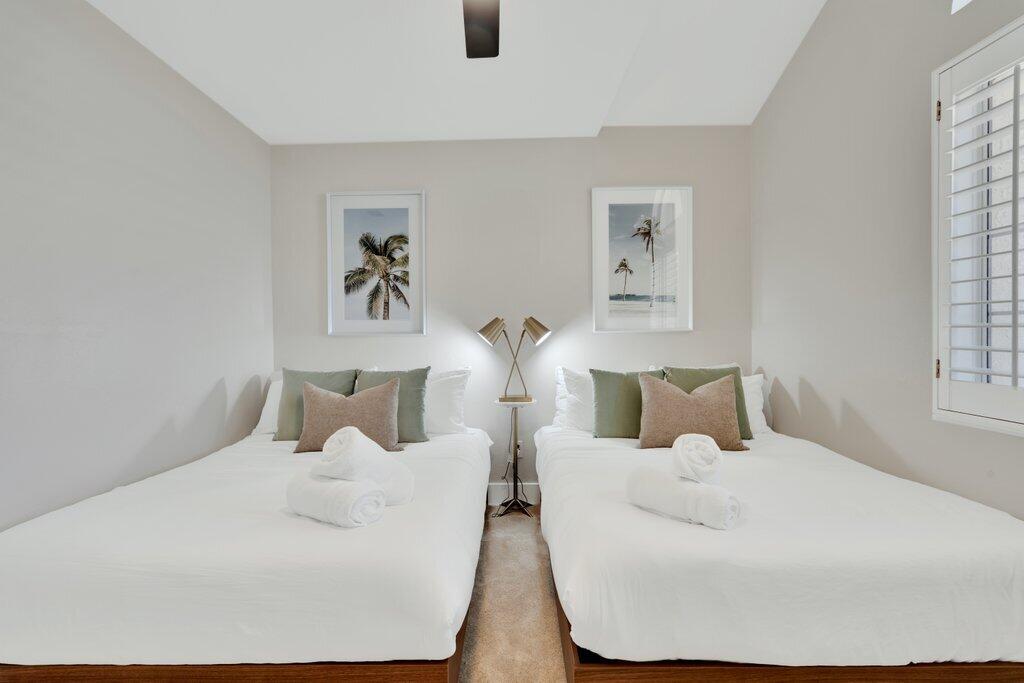 46352 Willow Lane Indio, CA 92201 - Photo 61 of 131 a bedroom with two beds and a window