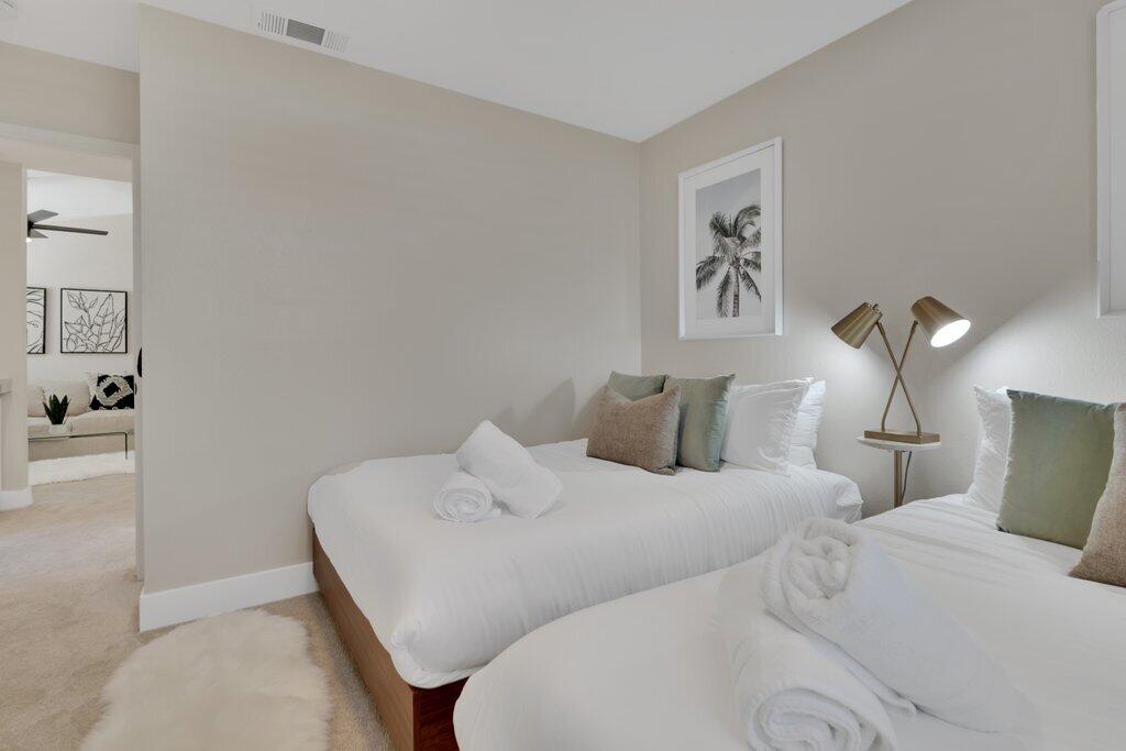 46352 Willow Lane Indio, CA 92201 - Photo 63 of 131 a bedroom with a bed and a painting on the wall