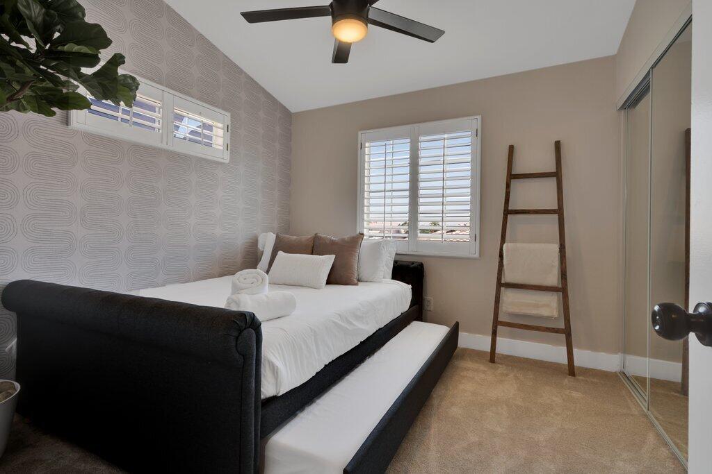 46352 Willow Lane Indio, CA 92201 - Photo 64 of 131 a bedroom with a bed and a window