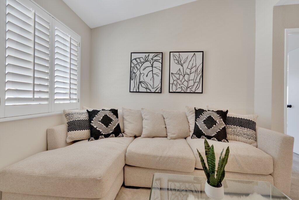 46352 Willow Lane Indio, CA 92201 - Photo 71 of 131 a bedroom with a bed and a couch