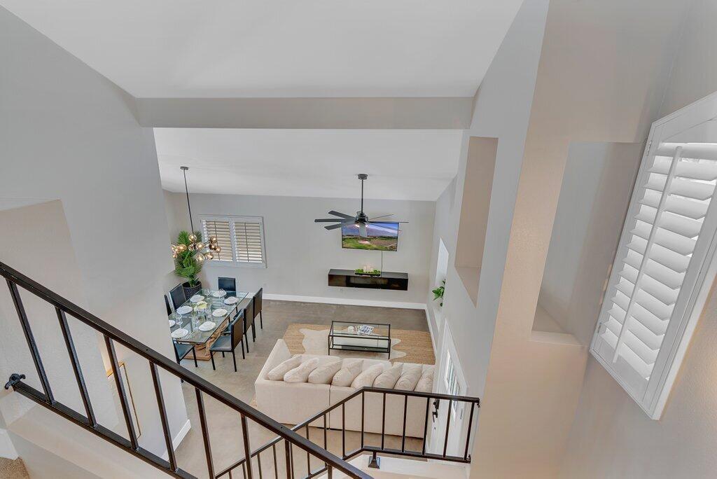 46352 Willow Lane Indio, CA 92201 - Photo 74 of 131 a view of a hallway with furniture and stairs