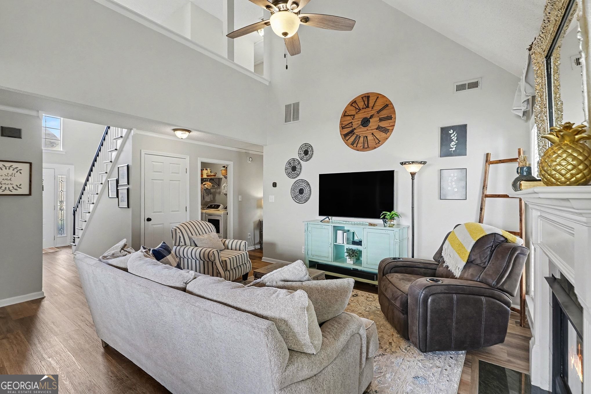 143 Pheasant Ridge Newnan, GA 30265 - Photo 11 of 27 a living room with furniture and a flat screen tv