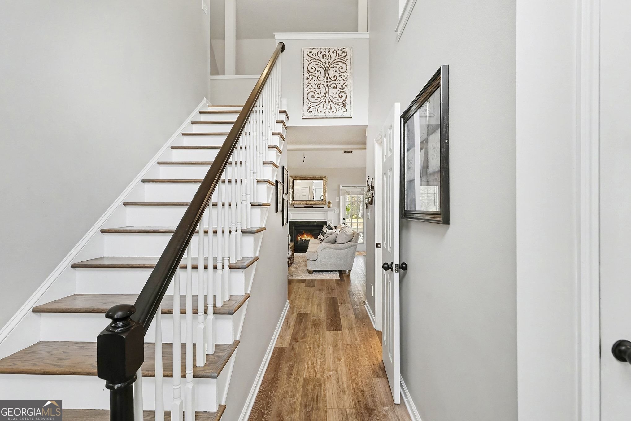 143 Pheasant Ridge Newnan, GA 30265 - Photo 3 of 27 a view of entryway with wooden floor
