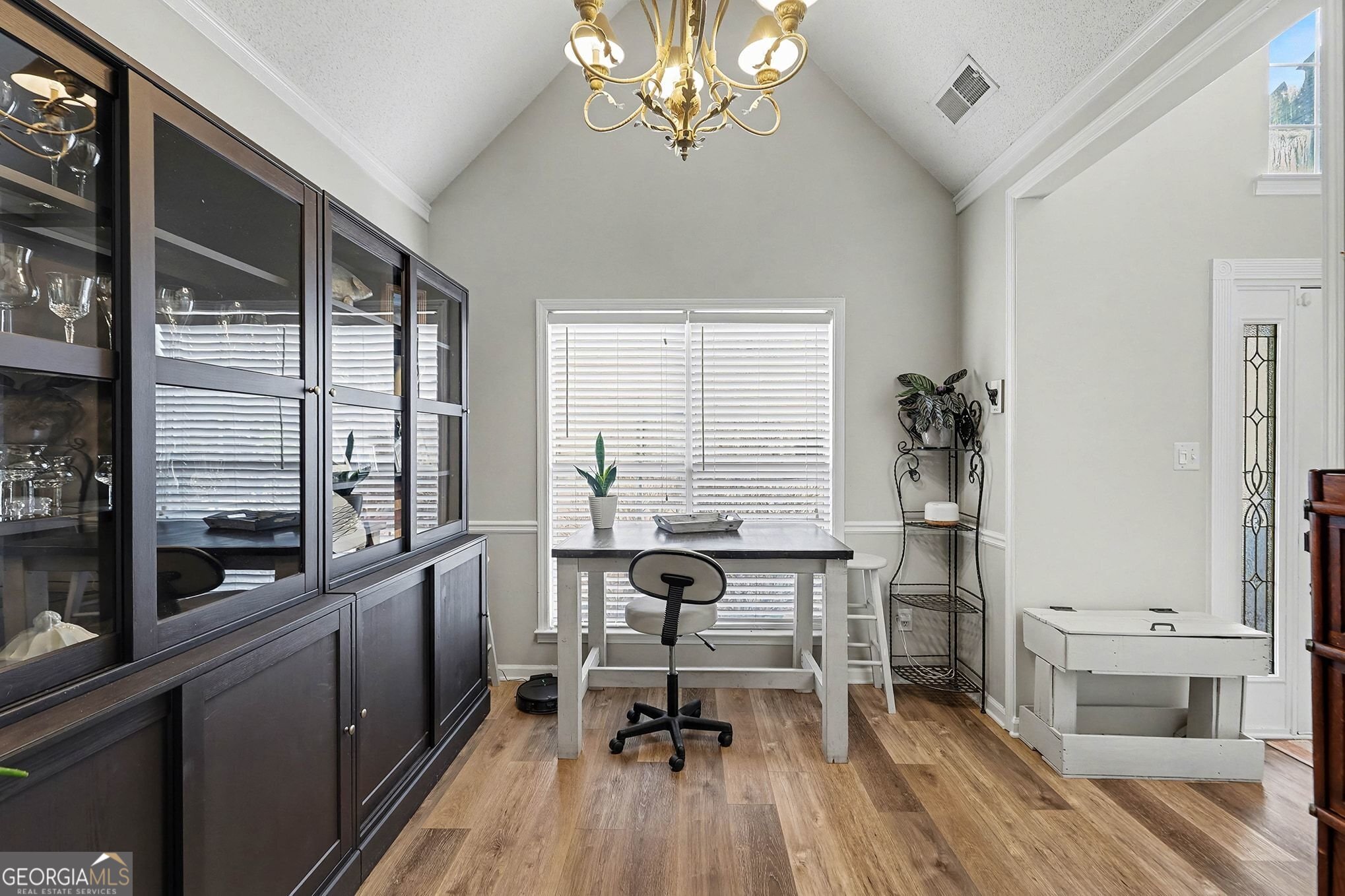 143 Pheasant Ridge Newnan, GA 30265 - Photo 5 of 27 a view of a dining room with furniture window and wooden floor
