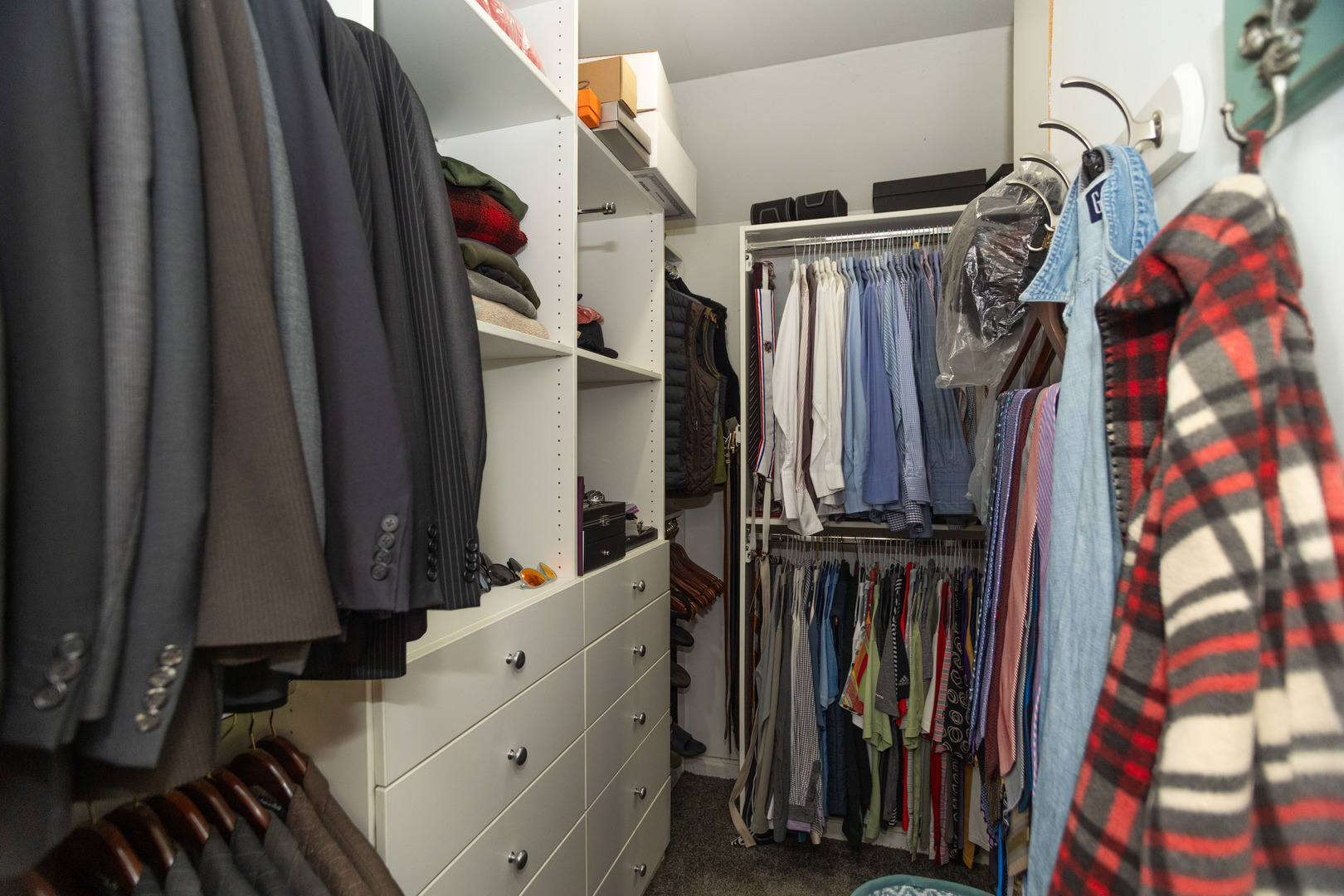 1663 West Farwell Avenue Chicago, IL 60626 - Photo 18 of 29 a view of walk in closet with clothes