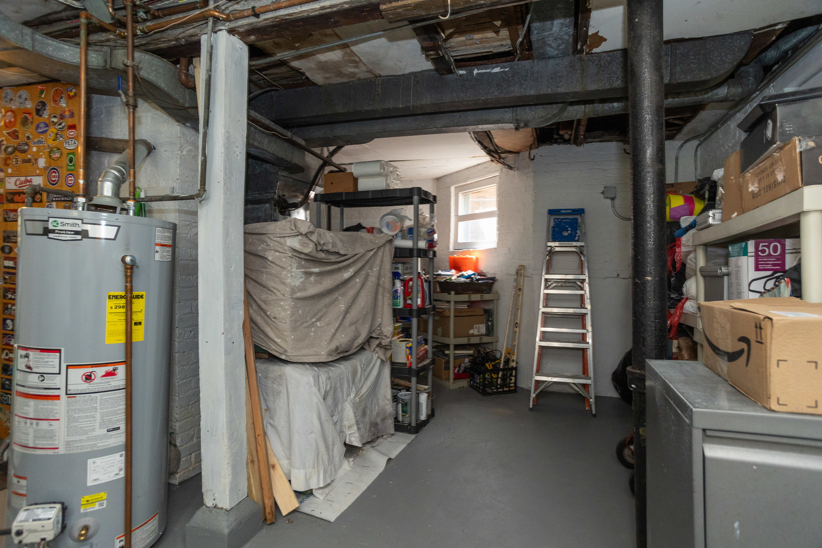 1663 West Farwell Avenue Chicago, IL 60626 - Photo 25 of 29 a view of walk in closet with clothes and shoes