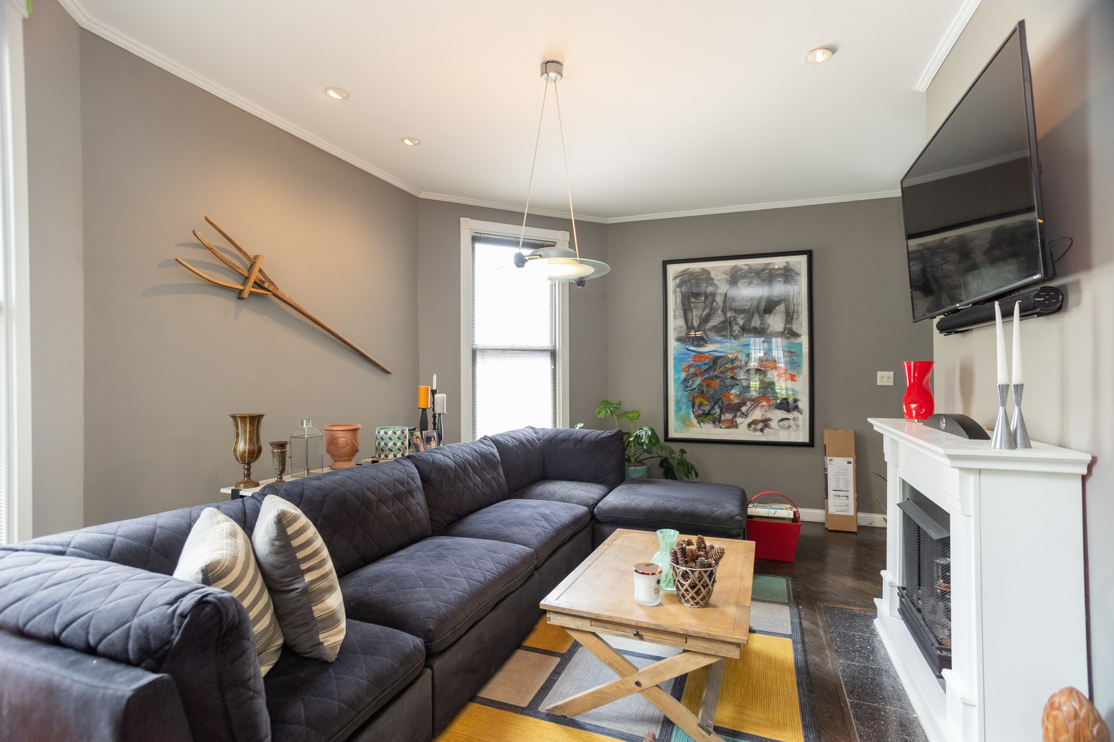1663 West Farwell Avenue Chicago, IL 60626 - Photo 8 of 29 a living room with furniture and a flat screen tv
