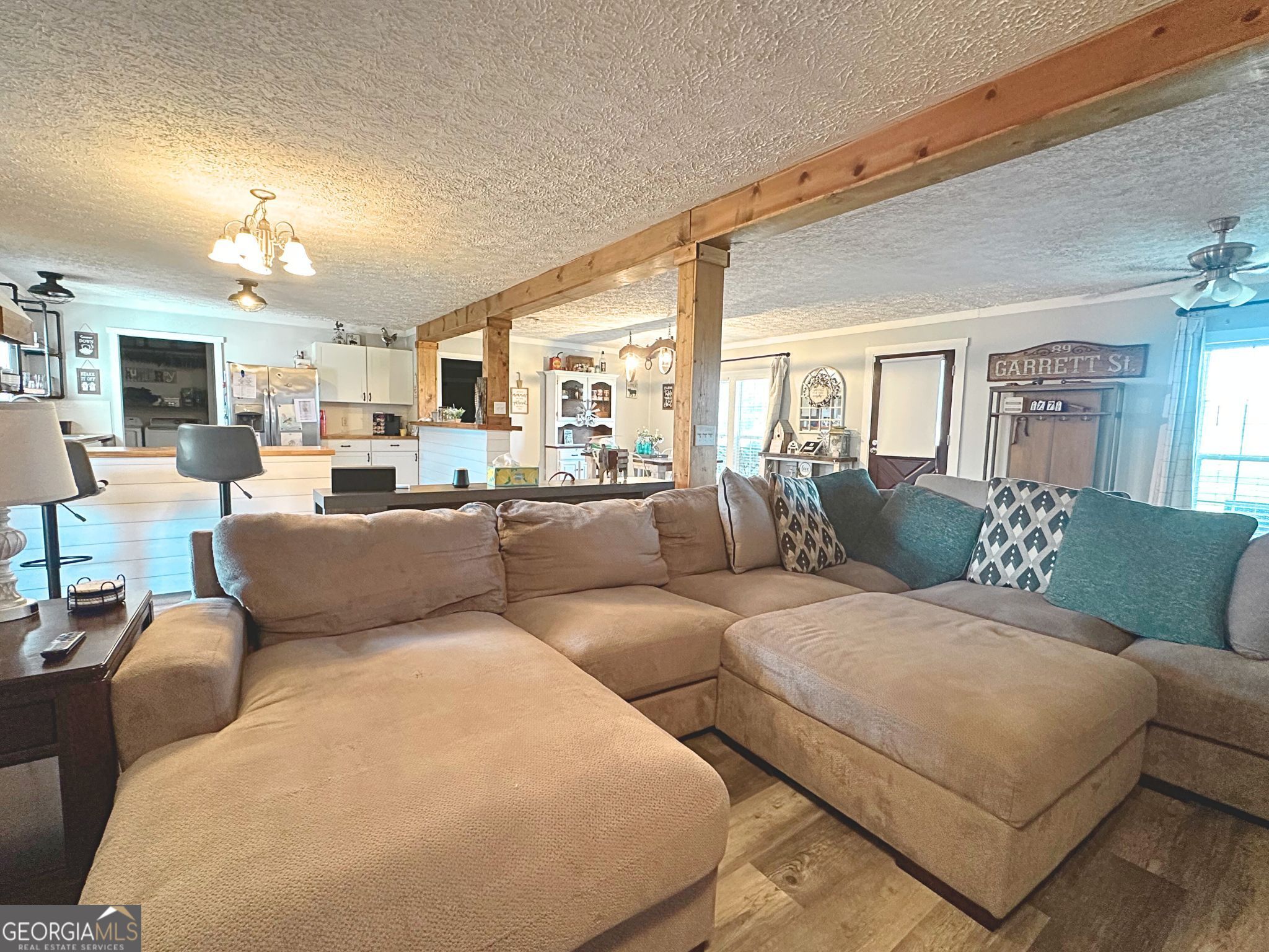 1391 Blue Springs Road Buckhead, GA 30625 - Photo 19 of 36 a living room with furniture and a large window