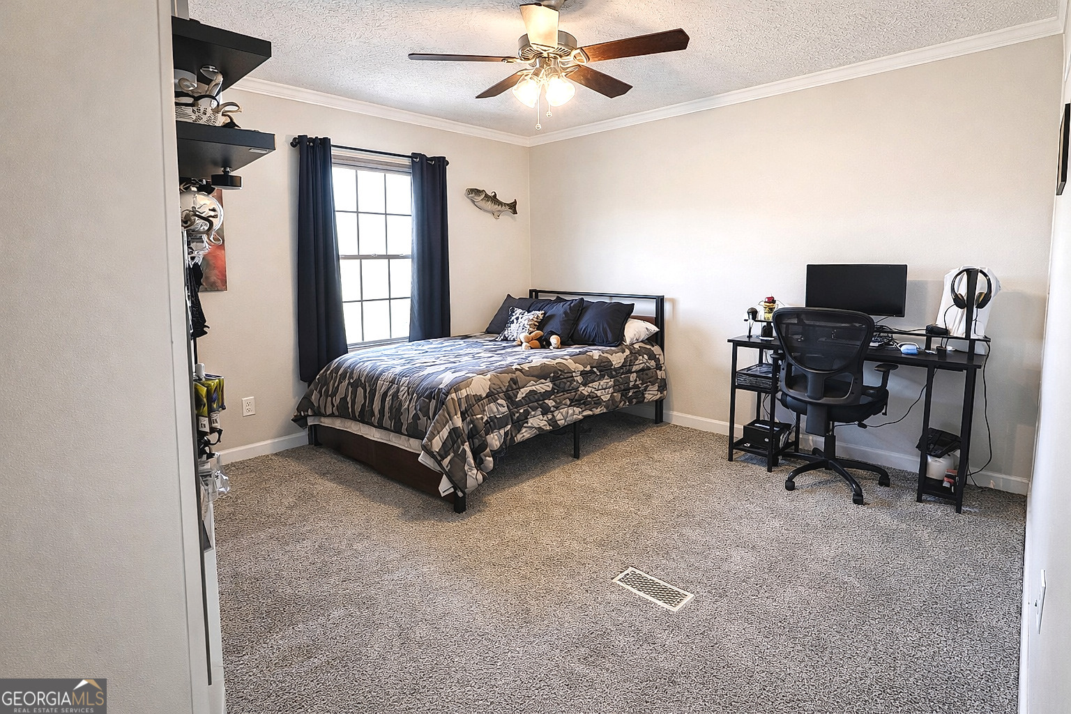 1391 Blue Springs Road Buckhead, GA 30625 - Photo 21 of 36 a spacious bedroom with a bed and a desk