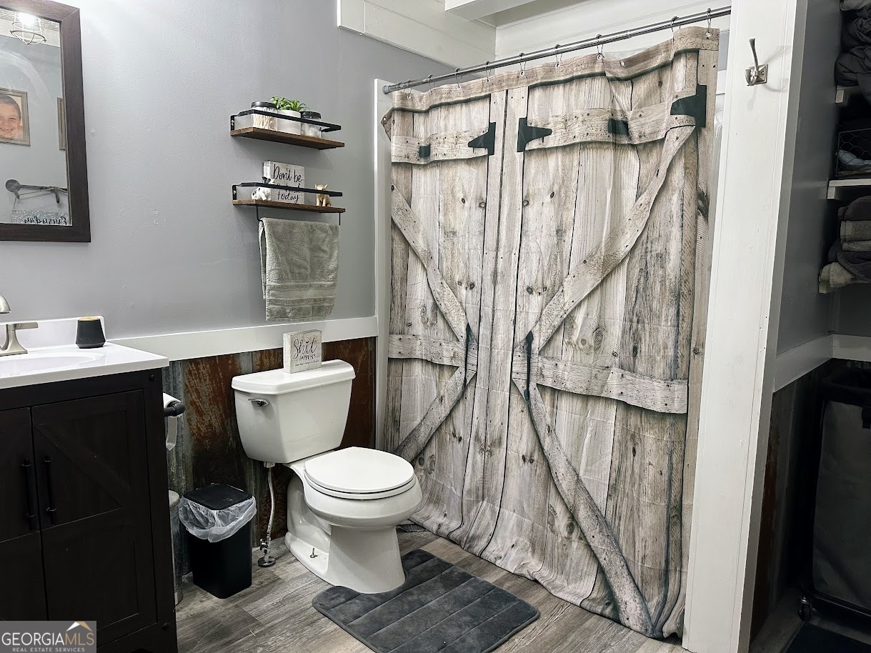 1391 Blue Springs Road Buckhead, GA 30625 - Photo 22 of 36 a bathroom with a toilet and a shower